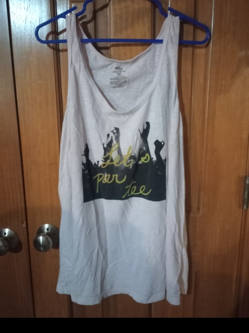 Secret Treasures White Tank Top with Black Crowd Graphic and Yellow Script
